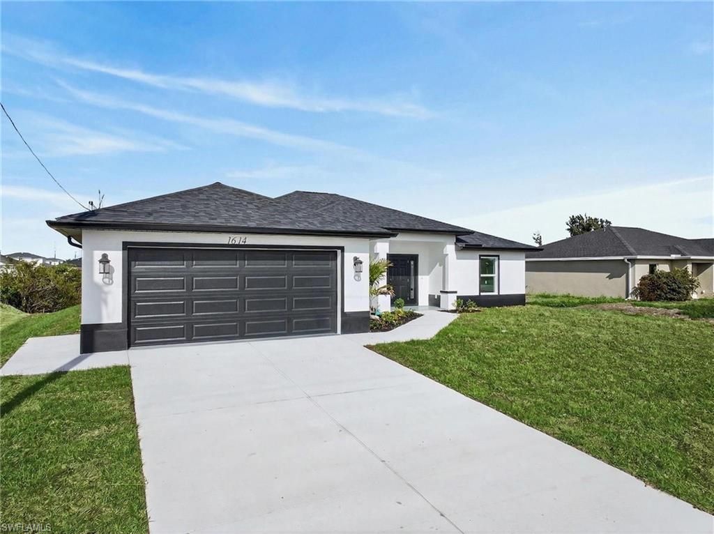1614 NE 6th AVE, CAPE CORAL, FL 33909 — photo 4