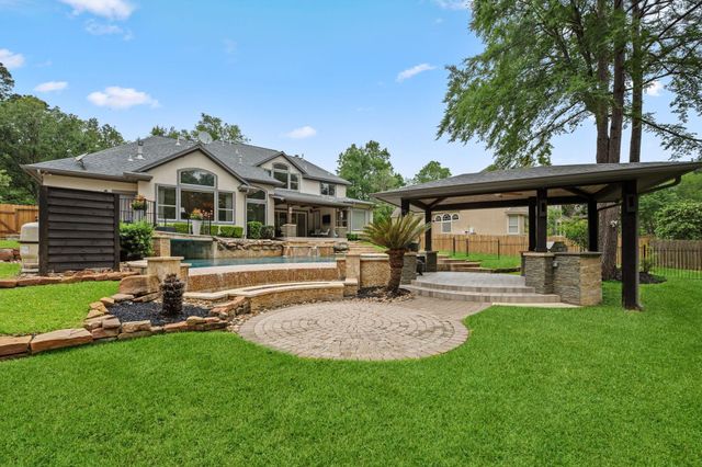 63 W Horizon Ridge Place, The Woodlands, TX 77381