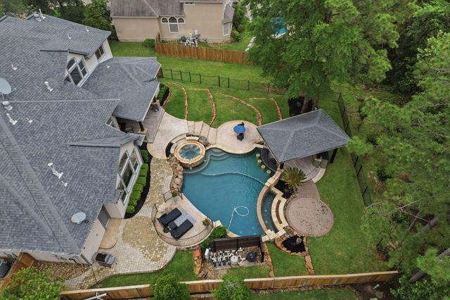 63 W Horizon Ridge Place, The Woodlands, TX 77381