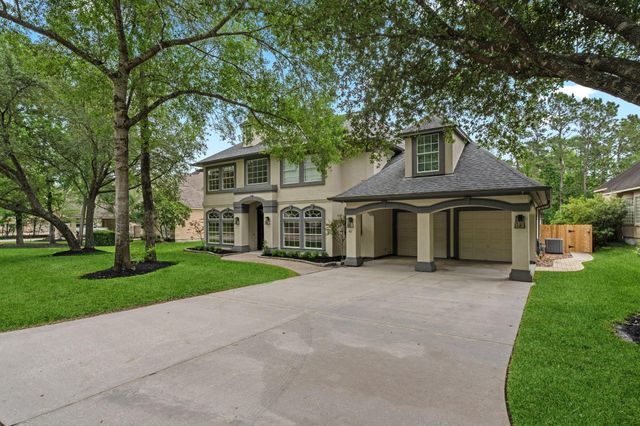63 W Horizon Ridge Place, The Woodlands, TX 77381