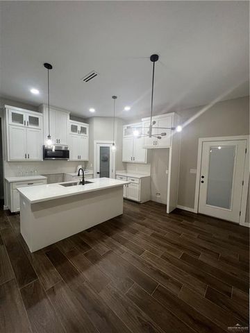 411 W 13th W Street, San Juan, TX 78589