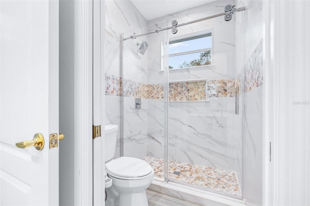 Image 37 of property listing at 10102 DEERCLIFF DRIVE, Tampa, FL 33647