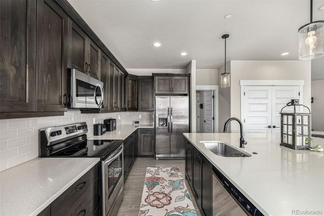 7377 Van Sickle Street, Strasburg, CO 80136