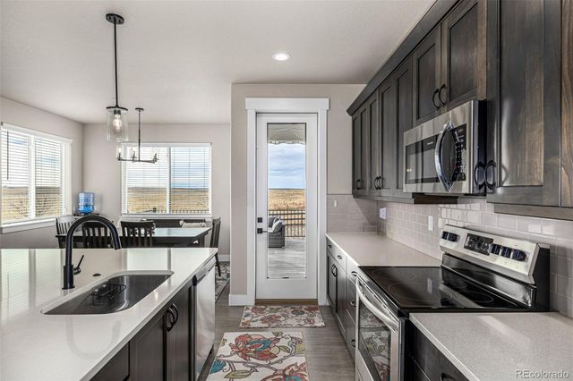 7377 Van Sickle Street, Strasburg, CO 80136