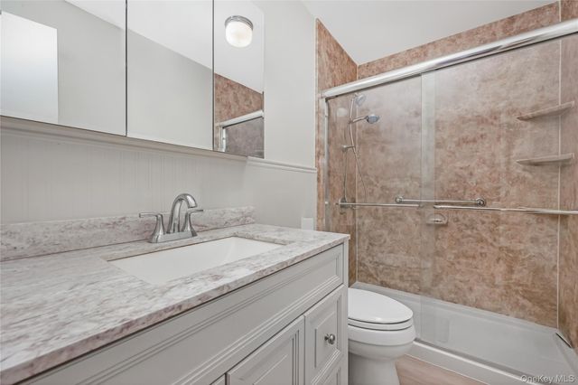 406 Woodbridge Drive B, Ridge, NY 11961