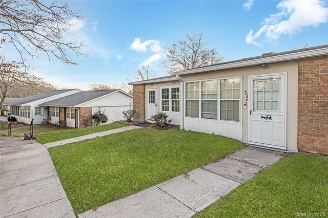 406 Woodbridge Drive B, Ridge, NY 11961