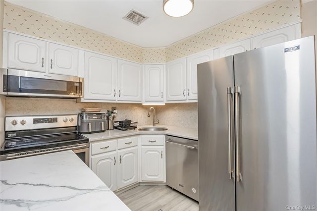 406 Woodbridge Drive B, Ridge, NY 11961