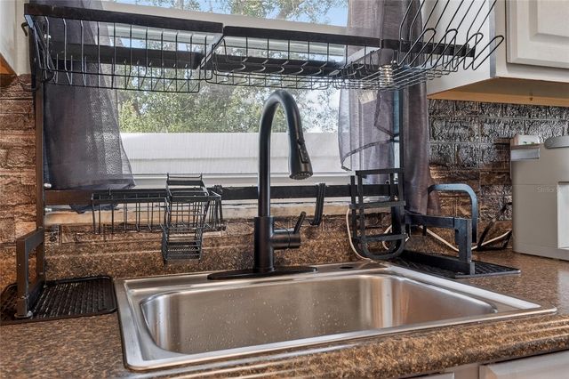 1001 WINDBROOK DRIVE, Deltona, FL 32725