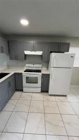 4010 LAKESIDE DRIVE 4010, Tamarac, FL 33319