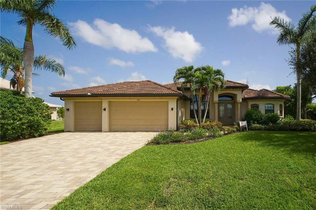 Image 1 of property listing at 1721 SW 41st ST, Cape Coral, FL 33914