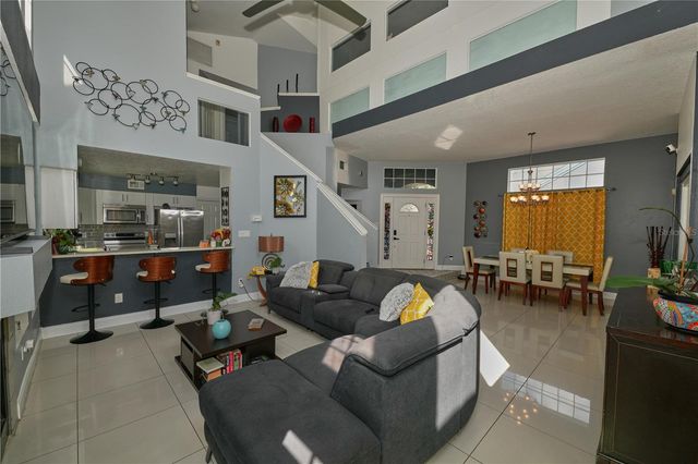 7305 VICTORIA CIRCLE 202, Orlando, FL 32835