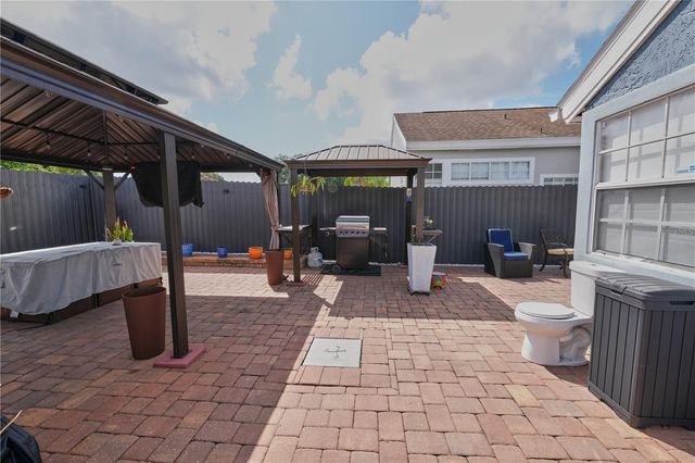 7305 VICTORIA CIRCLE 202, Orlando, FL 32835
