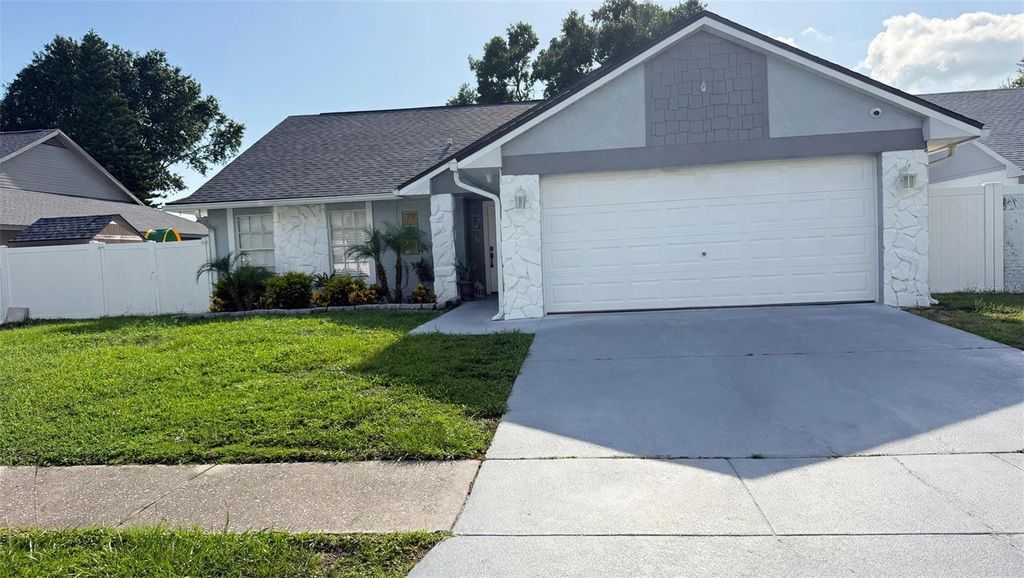 Image 2 of property listing at 7102 HOLLOWELL DRIVE, Tampa, FL 33634