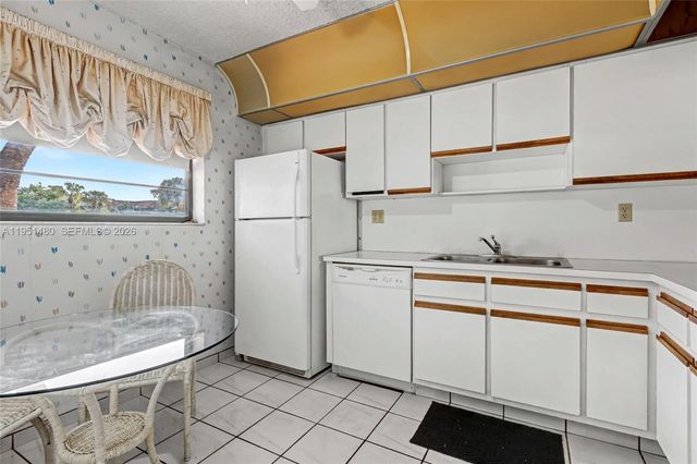 6085 N Sabal Palm Boulevard 208, Tamarac, FL 33319