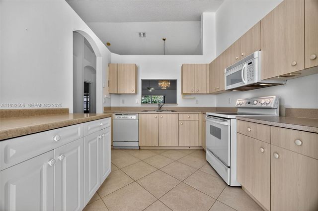 6069 Heliconia Rd, Delray Beach, FL 33484