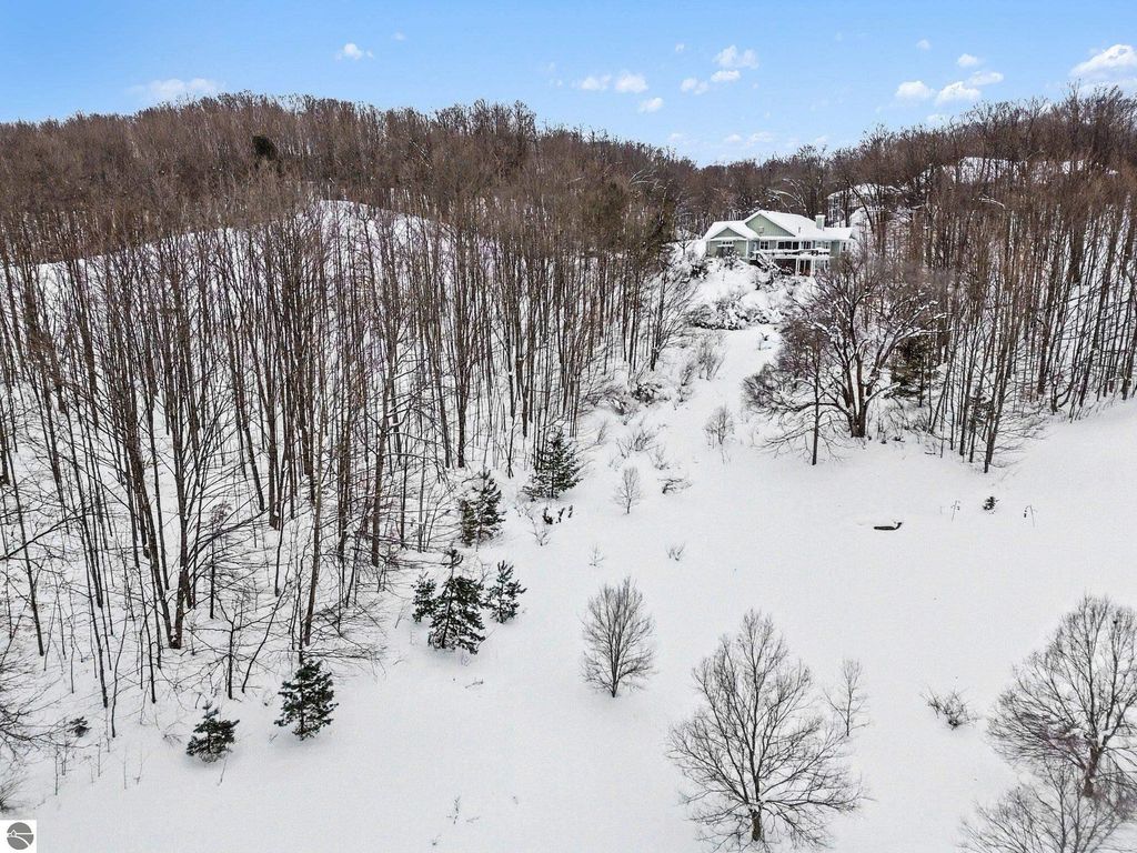 Image 13 of property listing at 4885 Grayhawk Boulevard, Traverse City, MI 49684