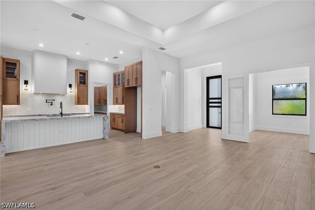 2997 64th ST SW, Naples, FL 34105