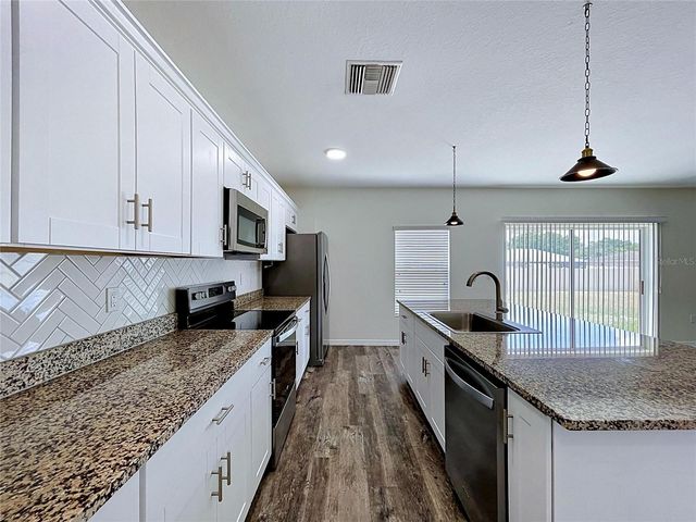 1396 AXEL CIRCLE, Winter Haven, FL 33880