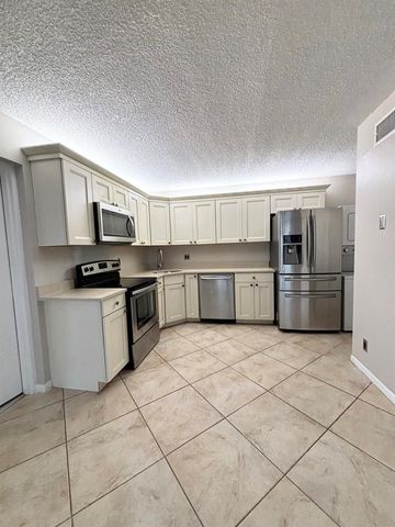 203 Foxtail Drive F1, Greenacres, FL 33415