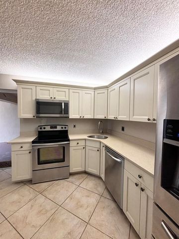203 Foxtail Drive F1, Greenacres, FL 33415