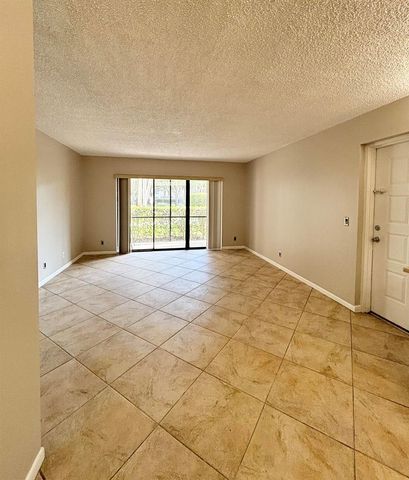 203 Foxtail Drive F1, Greenacres, FL 33415