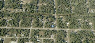 107 Moore Avenue, Lehigh Acres, FL 33936