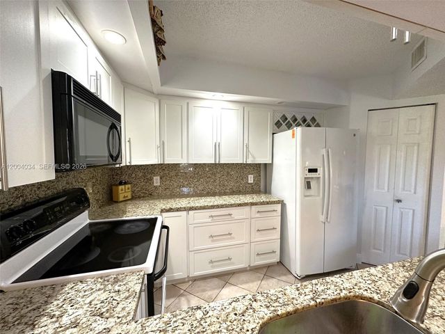 12551 SW 16th Ct 310C, Pembroke Pines, FL 33027