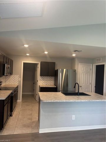 1143 NW 4th PL, Cape Coral, FL 33993
