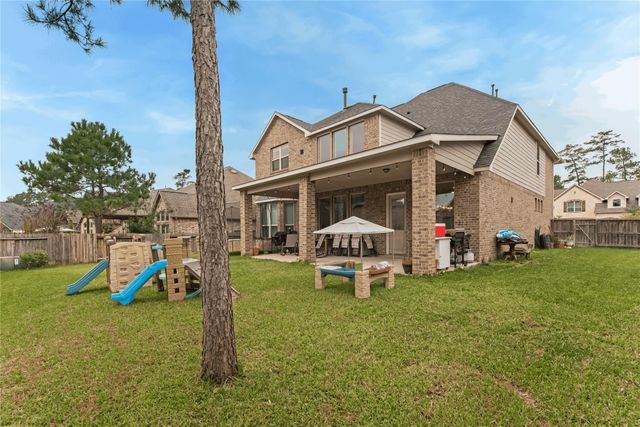 34427 Spring Creek Circle, Pinehurst, TX 77362