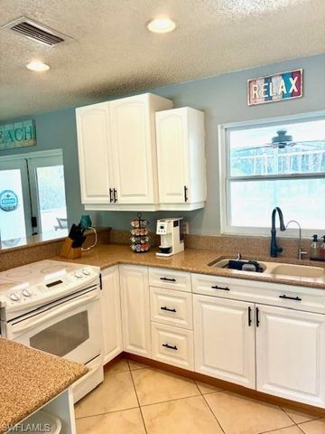 640 27th ST SW, Naples, FL 34117