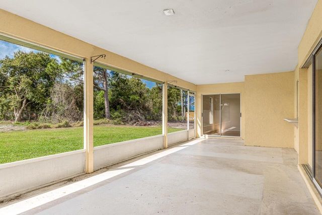 1126 SW Calmar Avenue, Port St. Lucie, FL 34953