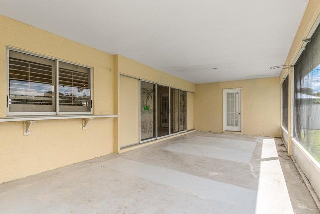 1126 SW Calmar Avenue, Port St. Lucie, FL 34953
