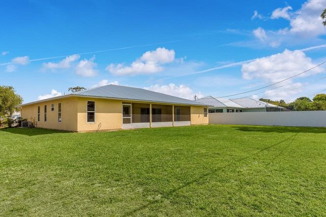 1126 SW Calmar Avenue, Port St. Lucie, FL 34953