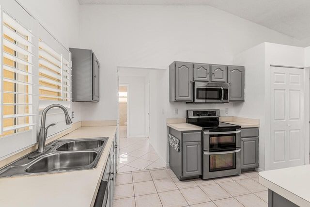 1126 SW Calmar Avenue, Port St. Lucie, FL 34953