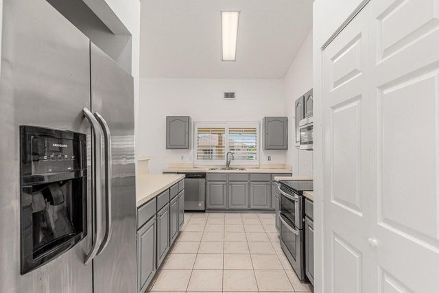 1126 SW Calmar Avenue, Port St. Lucie, FL 34953