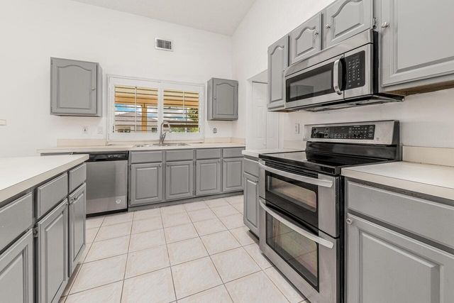 1126 SW Calmar Avenue, Port St. Lucie, FL 34953