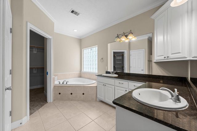 13003 Point Aquarius Boulevard, Willis, TX 77318