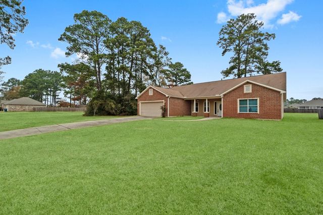 13003 Point Aquarius Boulevard, Willis, TX 77318