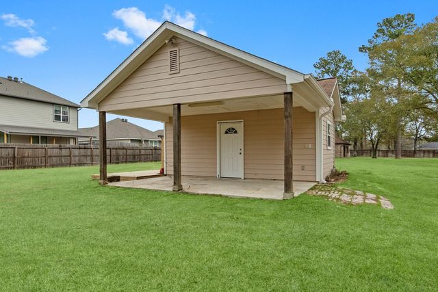 13003 Point Aquarius Boulevard, Willis, TX 77318