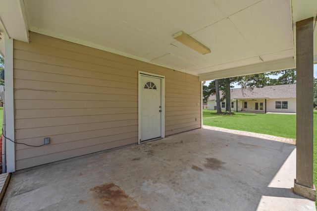 13003 Point Aquarius Boulevard, Willis, TX 77318