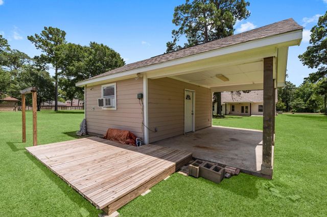13003 Point Aquarius Boulevard, Willis, TX 77318