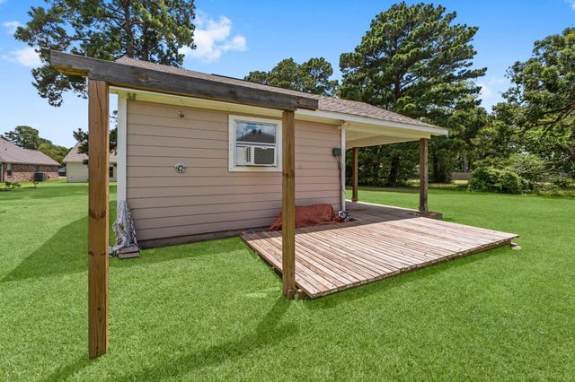 13003 Point Aquarius Boulevard, Willis, TX 77318