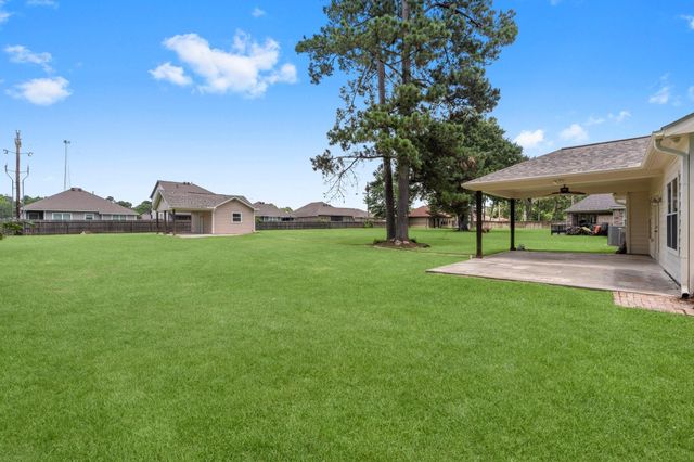 13003 Point Aquarius Boulevard, Willis, TX 77318