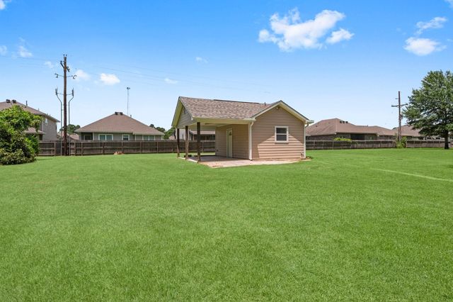 13003 Point Aquarius Boulevard, Willis, TX 77318