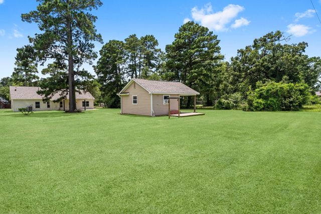 13003 Point Aquarius Boulevard, Willis, TX 77318