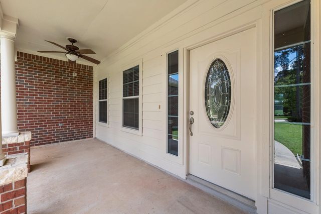 13003 Point Aquarius Boulevard, Willis, TX 77318