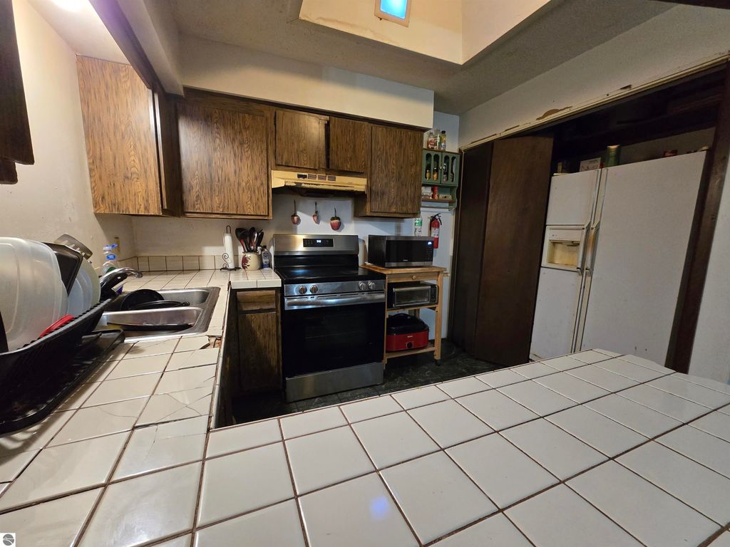 Image 10 of property listing at 6439 Tecumseh Avenue, Oscoda, MI 48750