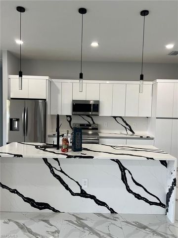 813 Aiken AVE, Lehigh Acres, FL 33974