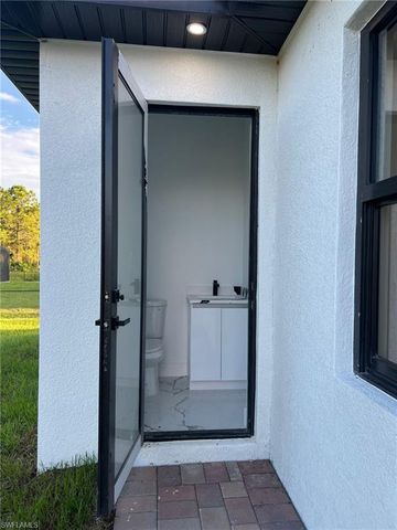 813 Aiken AVE, Lehigh Acres, FL 33974