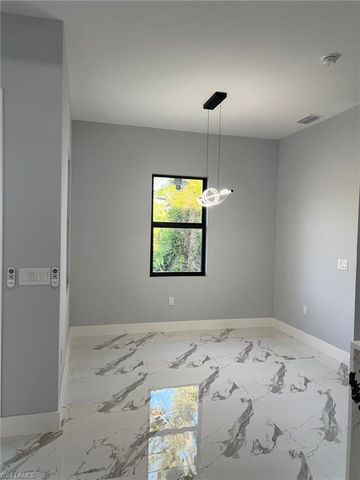 813 Aiken AVE, Lehigh Acres, FL 33974